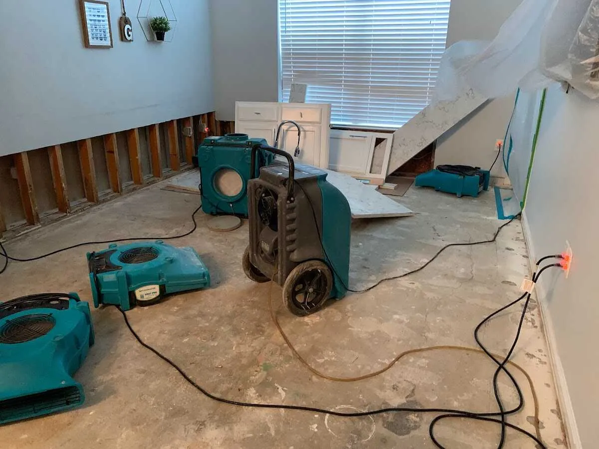 Dehumidifier in flood-cut room for Water Damage Restoration in University Place